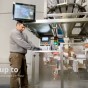 pre made pouch filling packaging machine with worker