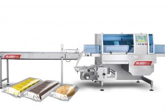 SleekWrapper Inverted horizontal wrapping machine with baked goods for packaging