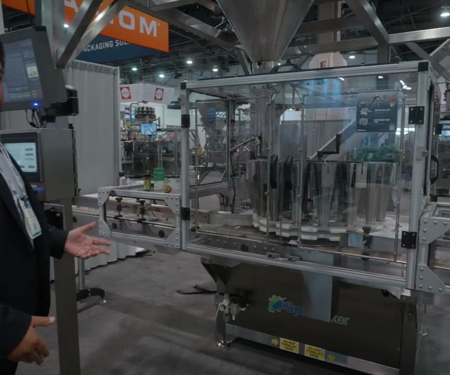 SpinDexer Rotary Bottle Filling Machine Explanation at Pack Expo 2023