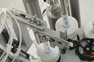 Tubes being filled in tube filling machine